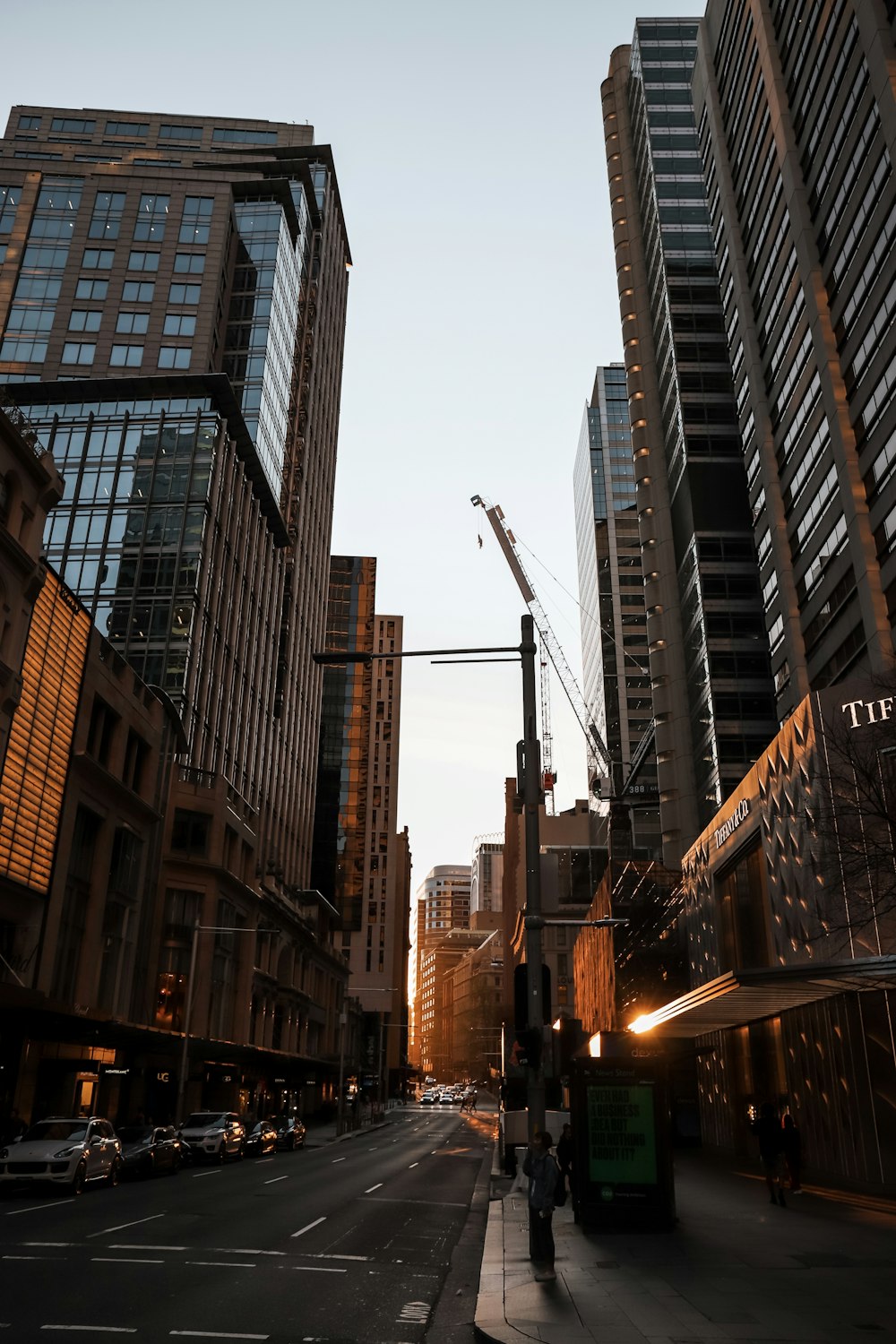 a city street filled with lots of tall buildings