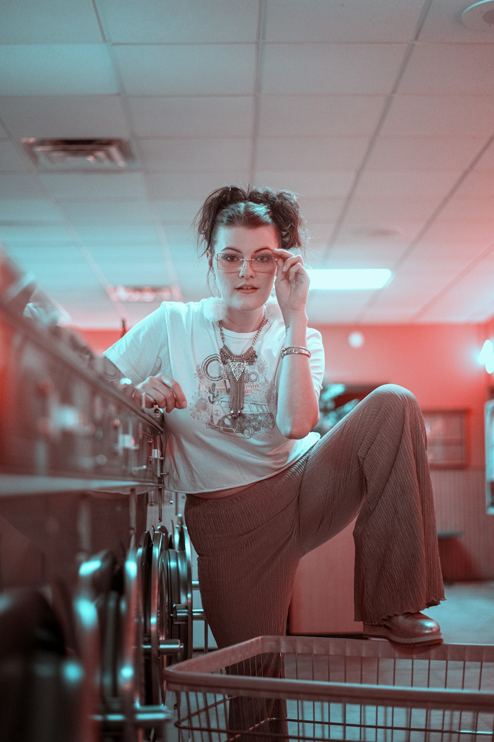 a woman sitting on top of a bike in a room