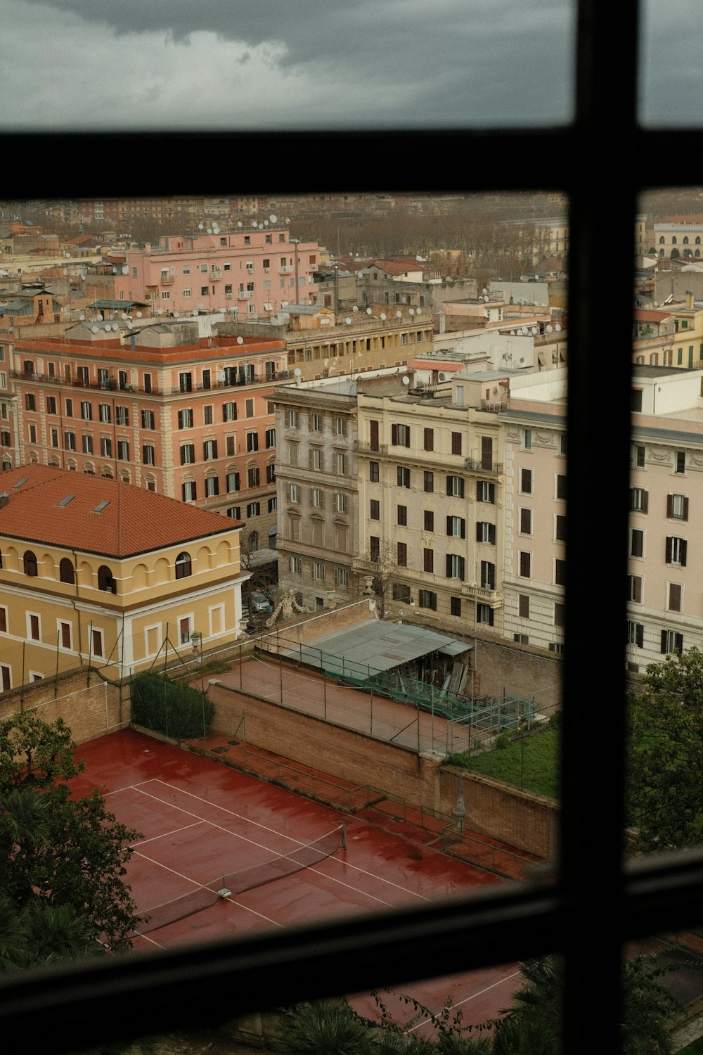 a view of a tennis court from a window