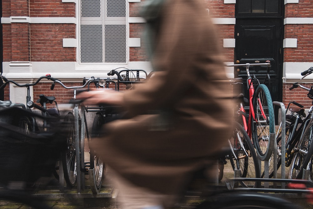 a blurry photo of a person riding a bike