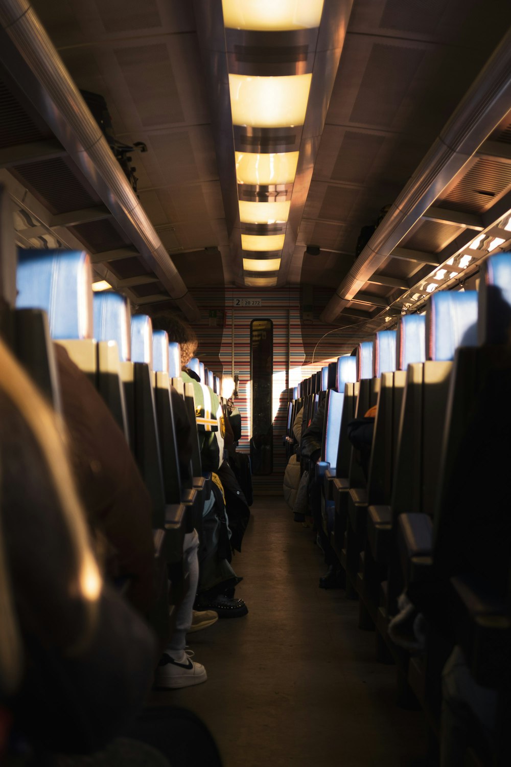 a train car with people sitting in it