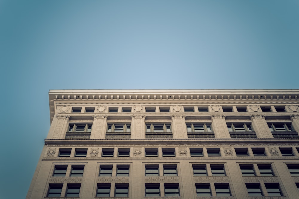 a tall building with a clock on the side of it