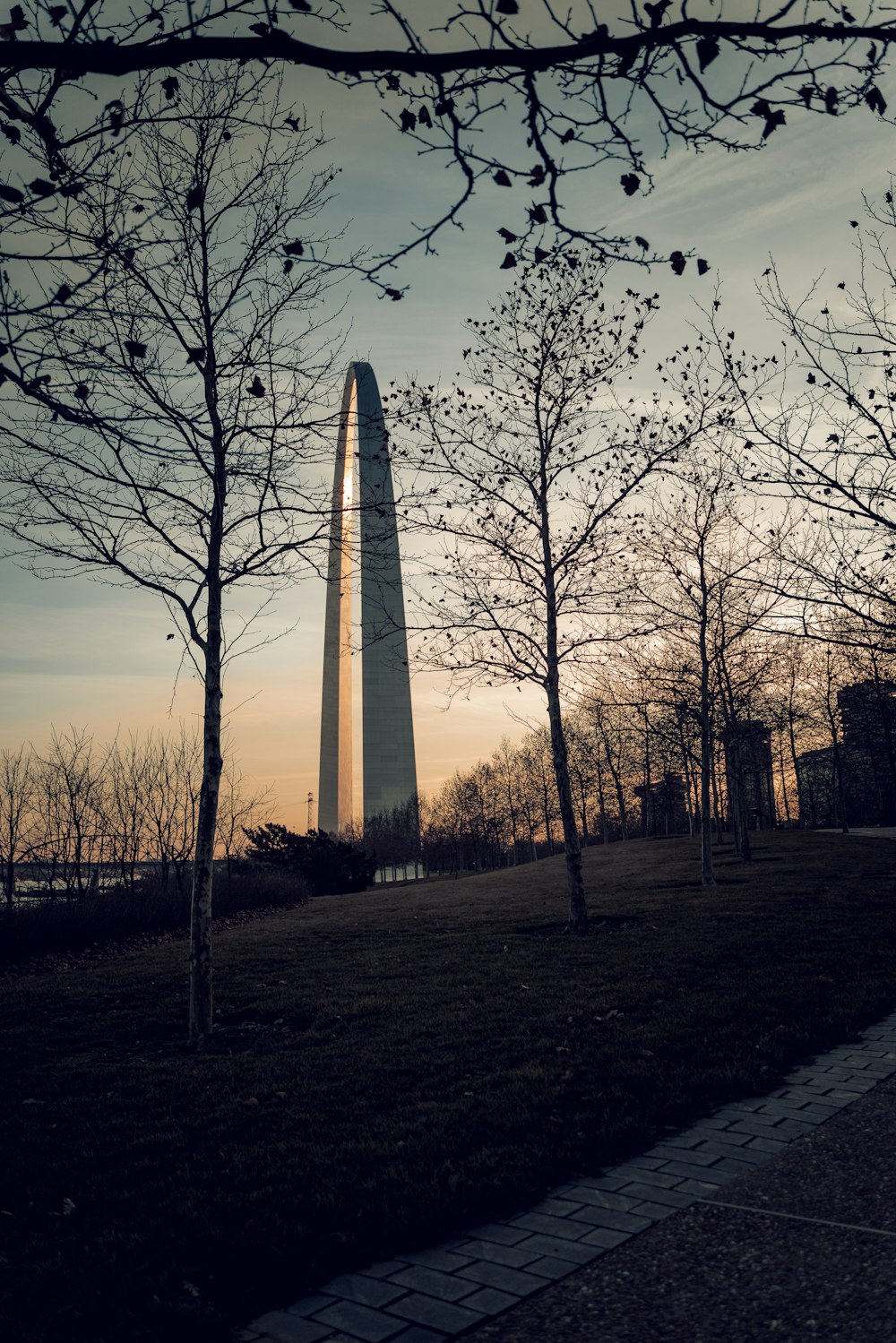 a view of the washington monument at sunset