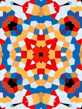 Close-up of a user clicking the save button on a colorful kaleidoscope pattern.