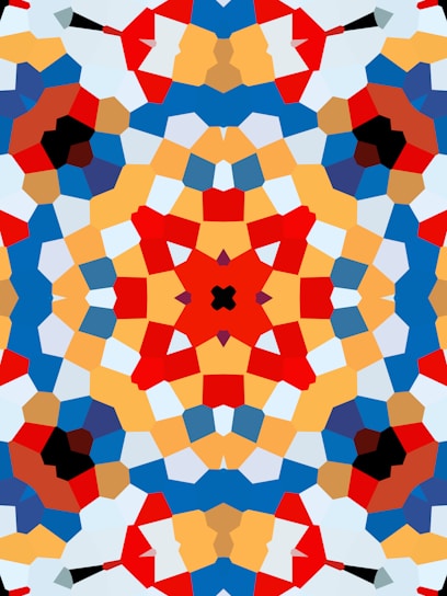 A vibrant, swirling kaleidoscope pattern bursting with colors and geometric shapes.