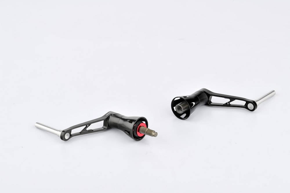 a pair of black bicycle pedals on a white background