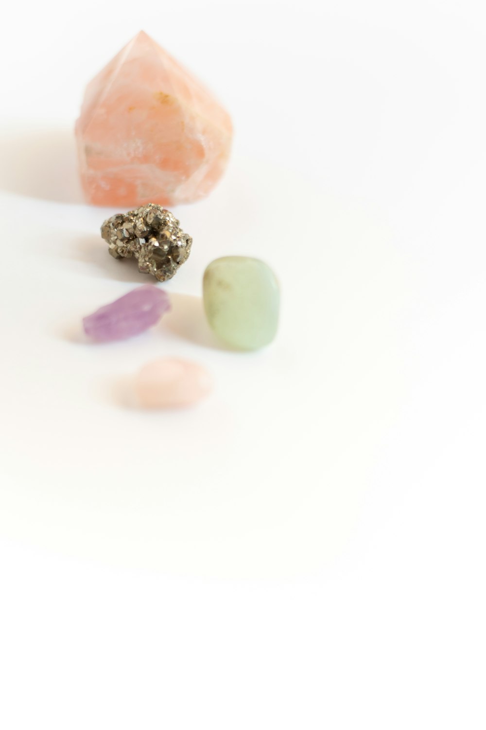 a couple of rocks sitting on top of a white table