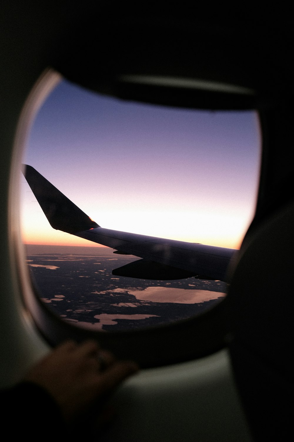 a view of the wing of an airplane from a window