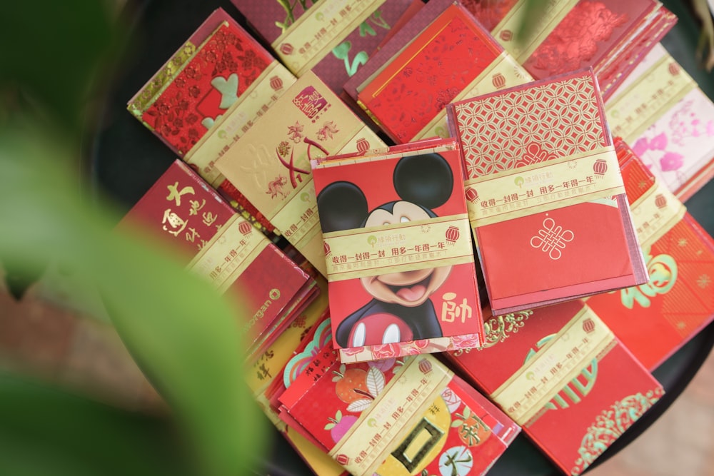 a mickey mouse passport sitting on top of a table