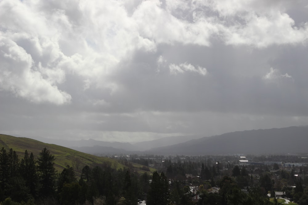 a view of a city with mountains in the background