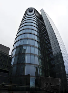 A sleek commercial complex showcasing contemporary design and vibrant surroundings.