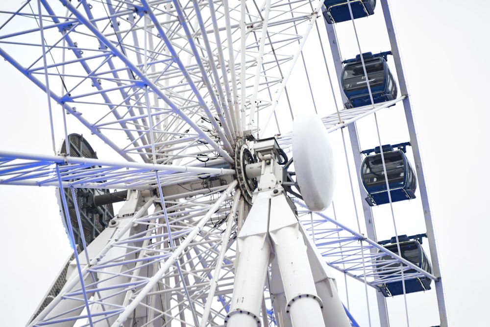 a ferris wheel with a sky in the background