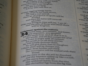 A close-up view of a page from a book, displaying text in a column format. The text is printed in black on a white page, with numbers and sections bolded for emphasis.