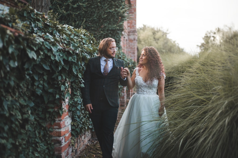 a man and a woman are walking together