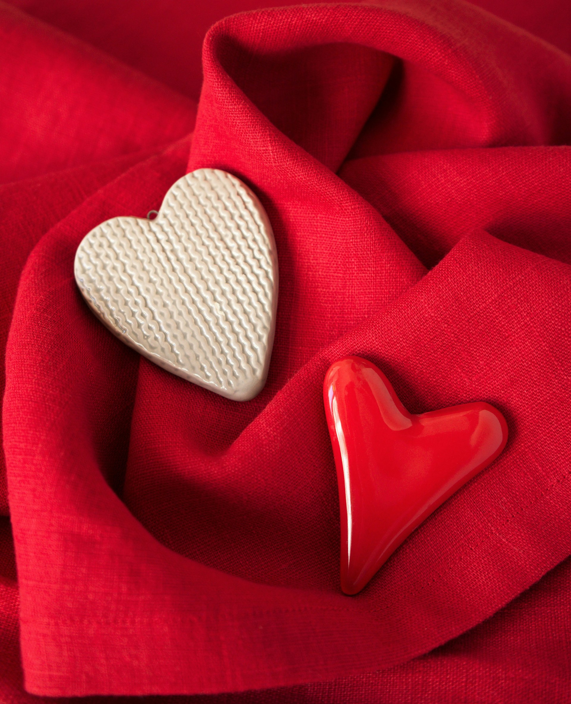 a red cloth with a white heart on it