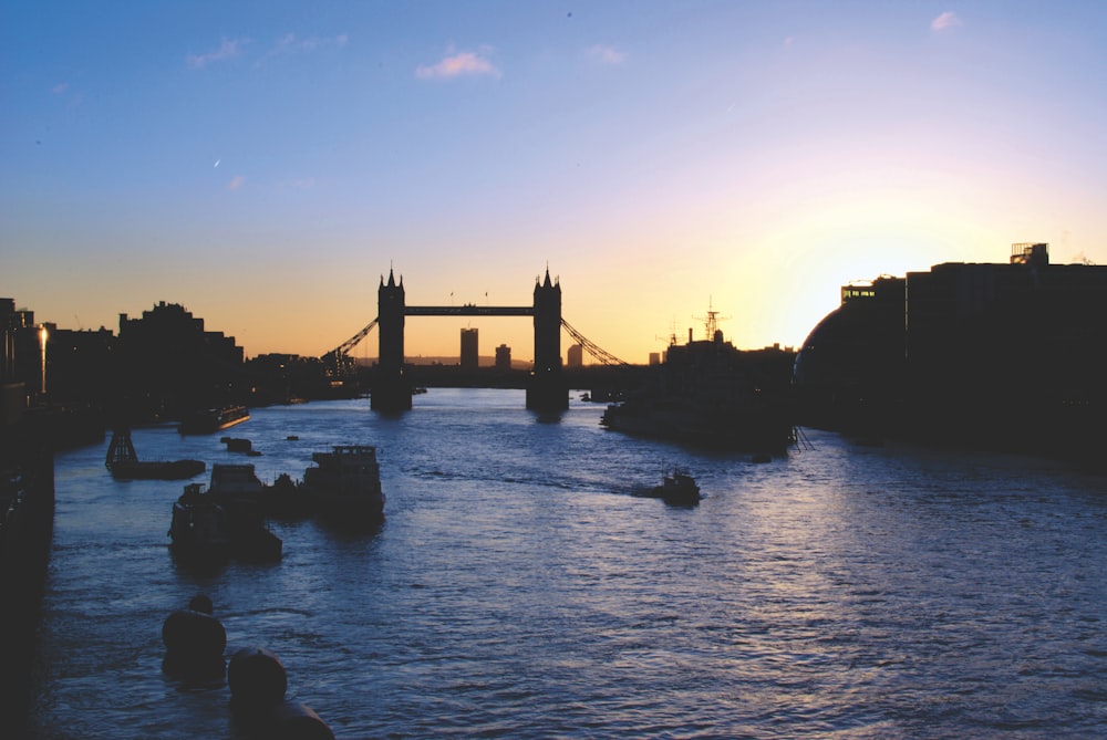 the sun is setting over the city of london