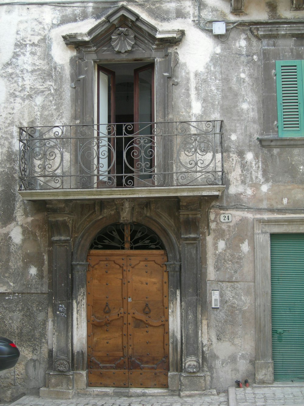 a motorcycle parked in front of an old building