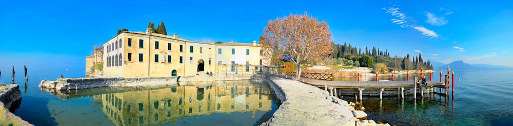 a large building sitting on top of a body of water