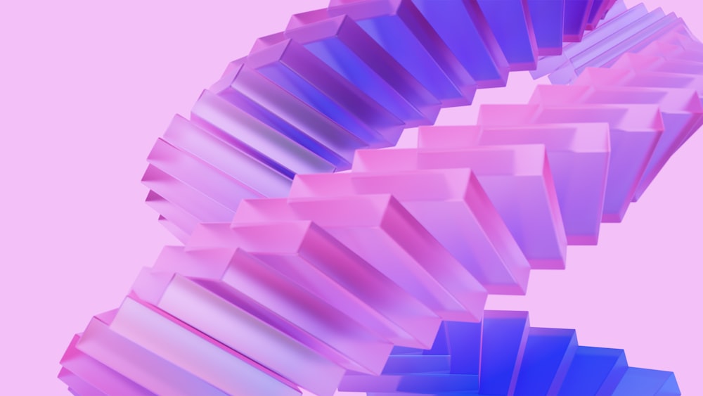 a pink and blue abstract design on a pink background