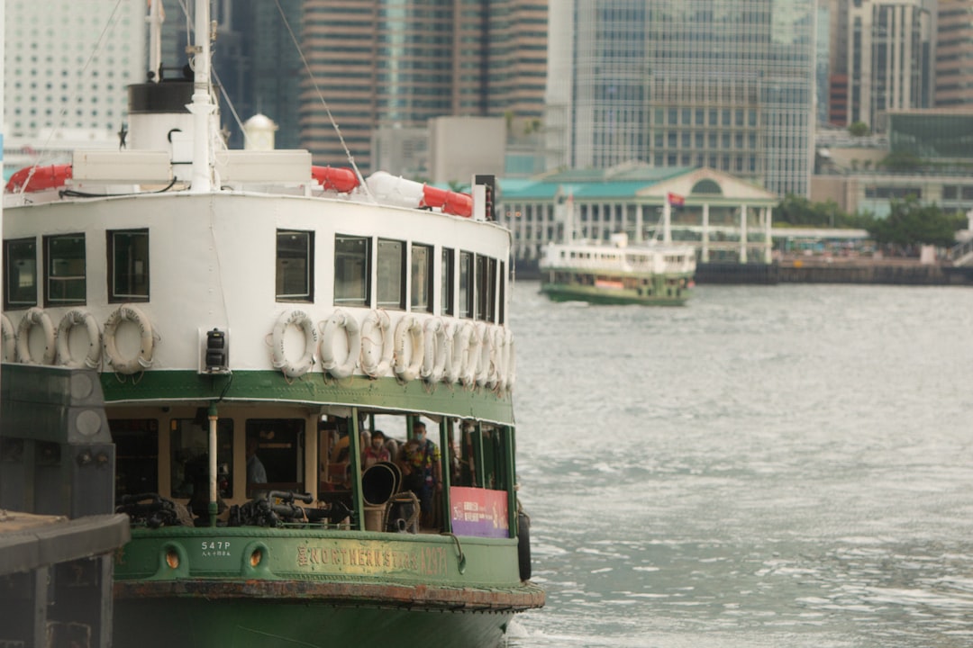a large boat floating on top of a body of water,
