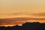 Sunset view over the Andes mountains seen from a high-altitude trail during a Kraken Tours Bolivia adventure.