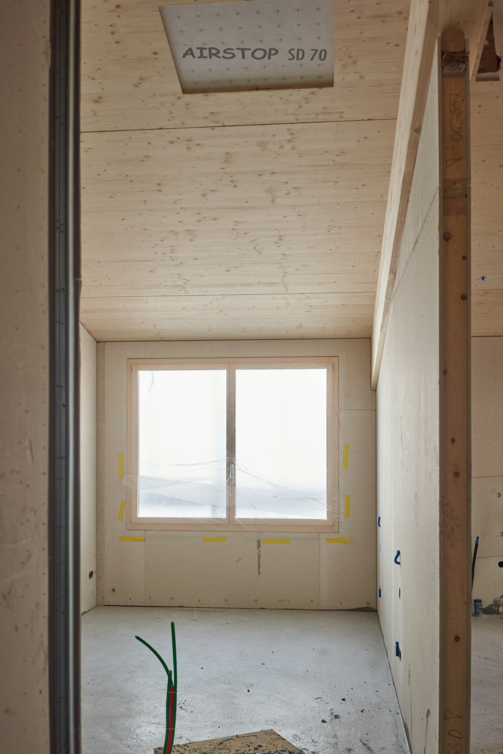 a room that is under construction with a window