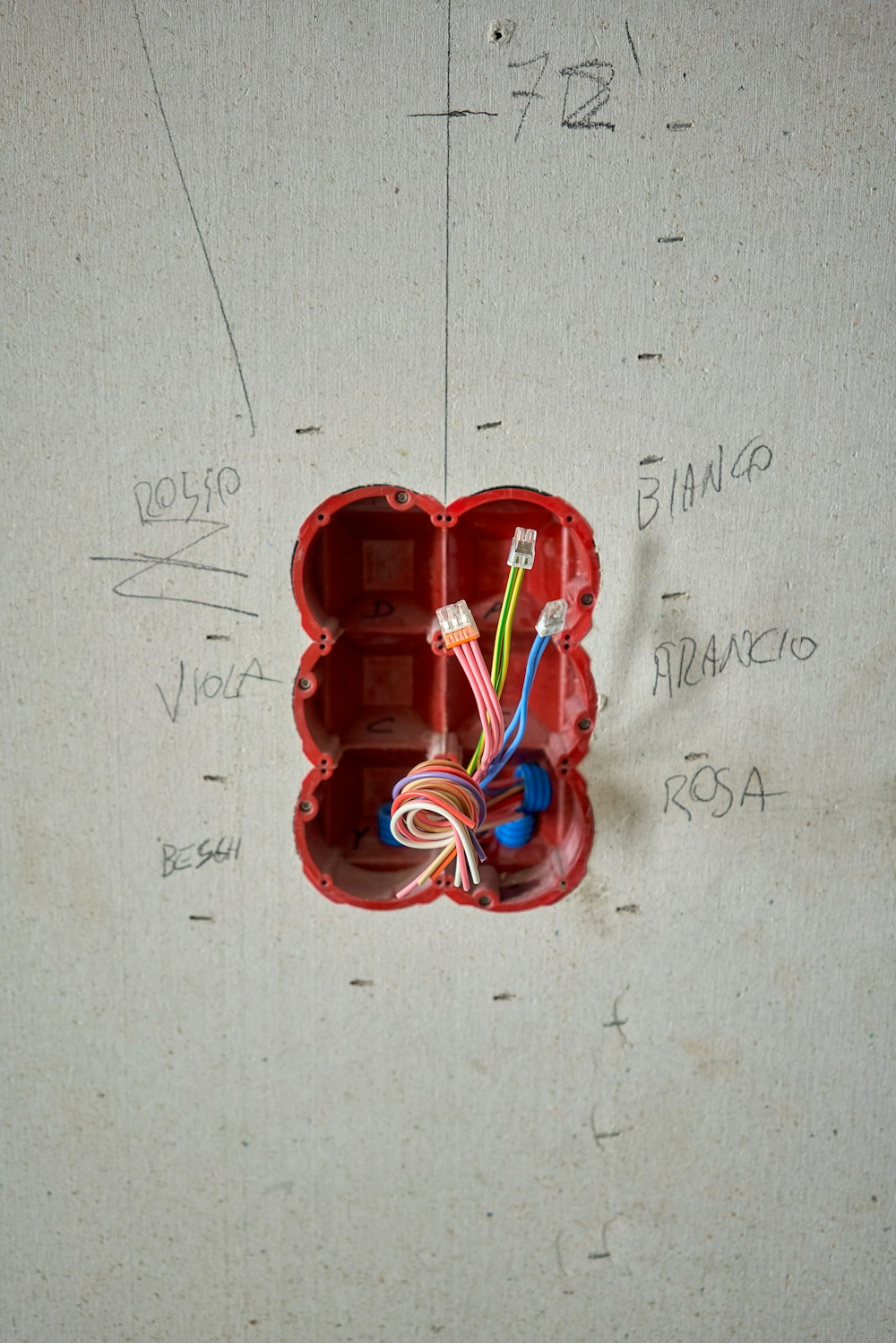 a red object with wires and wires in it
