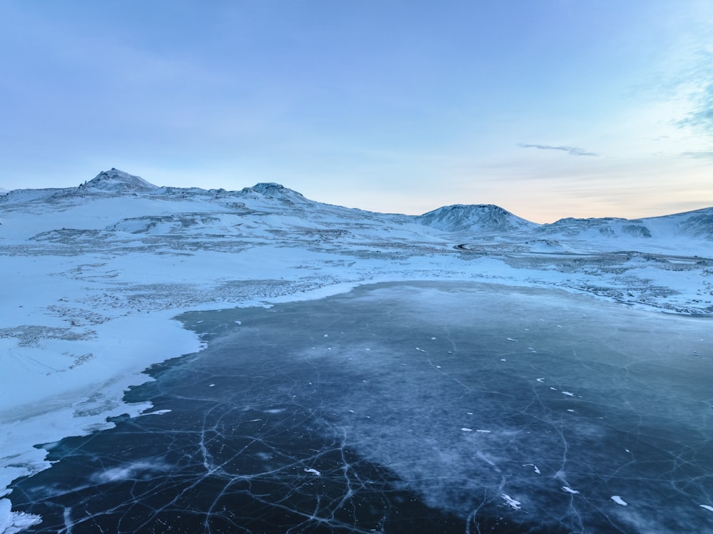 a mountain range covered in snow and ice