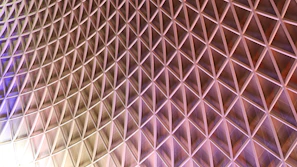 Architectural-inspired diamond design showcasing layered cuts and precise symmetry in deep obsidian charcoal.