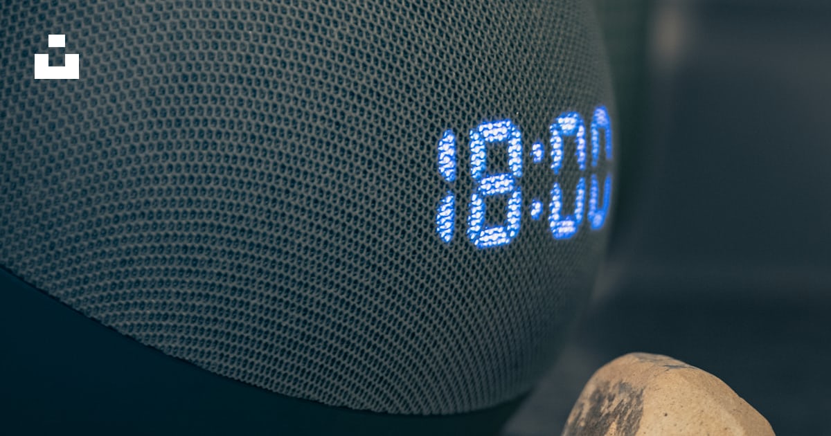A Bluetooth Speaker Sitting Next To A Rock Photo Free Clock Image On a-bluetooth-speaker-sitting-next-to-a-rock-photo-free-clock-image-on