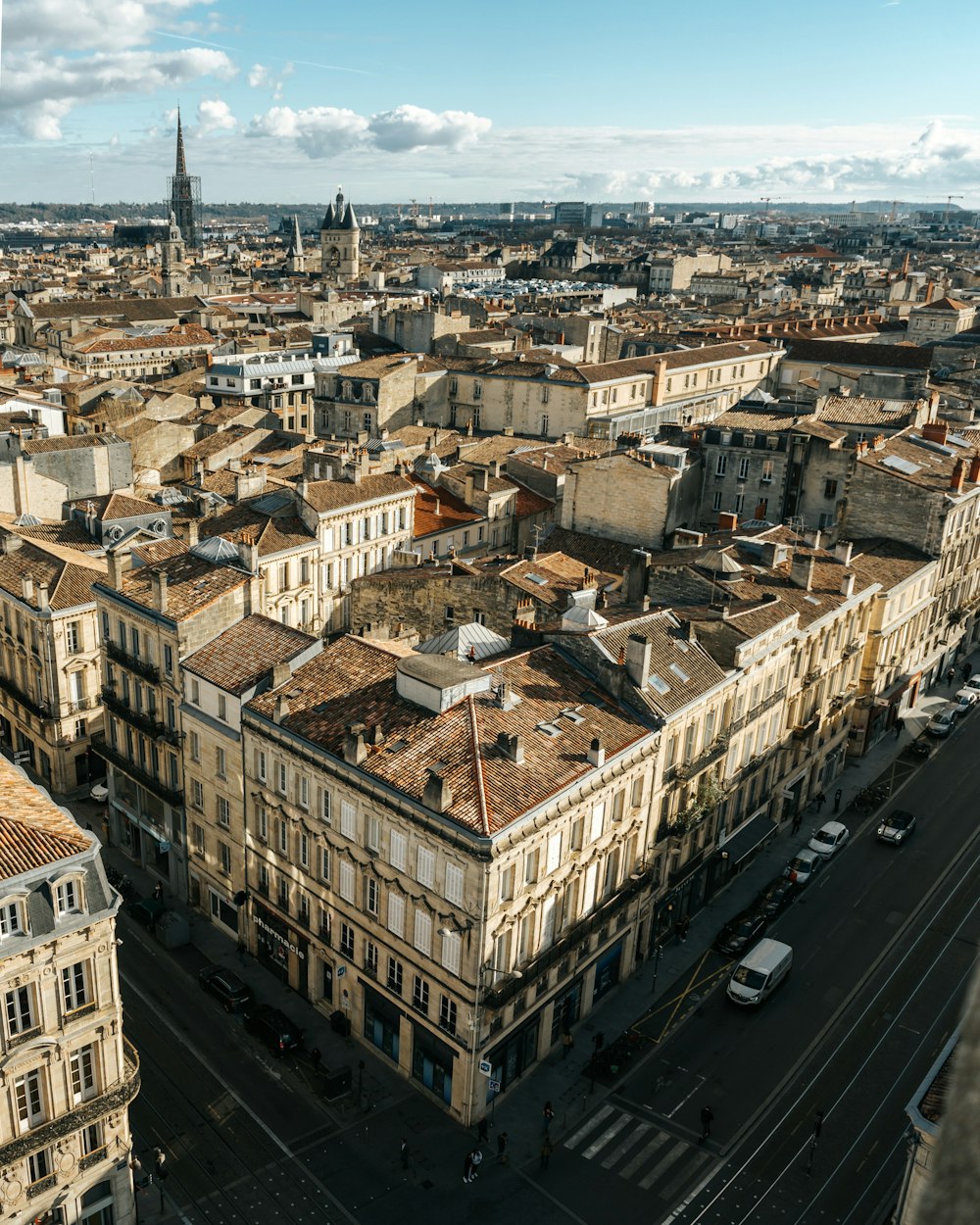 an aerial view of a city with tall buildings