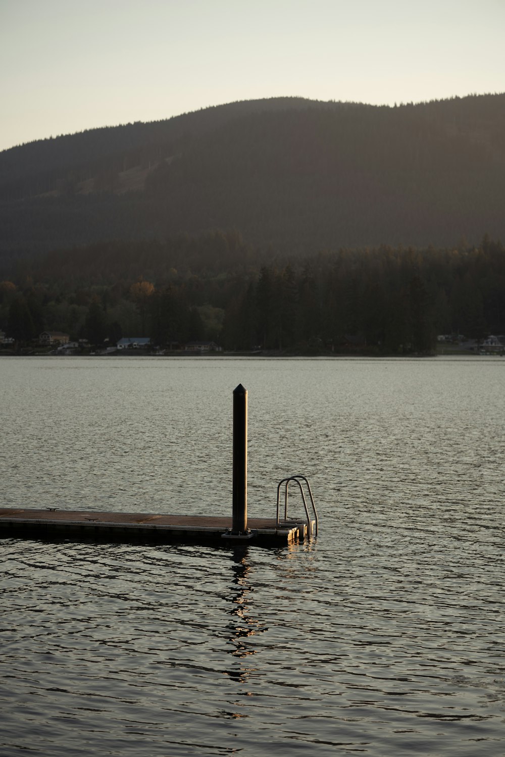 a boat dock in the middle of a lake