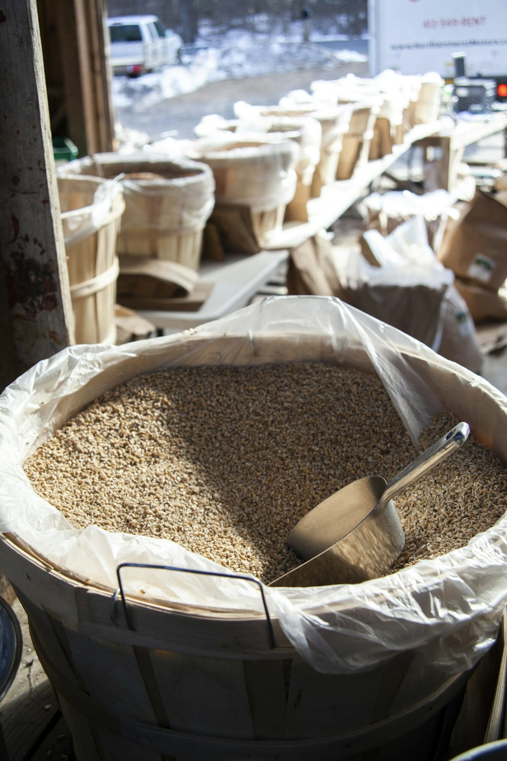 a bucket filled with lots of brown grains