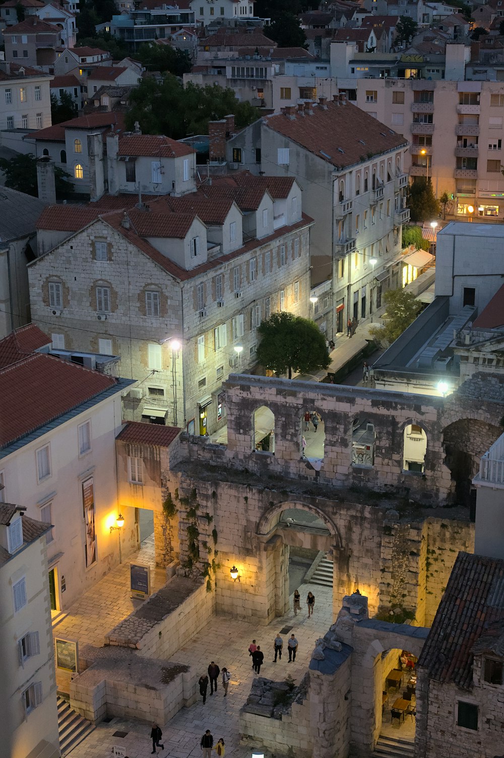 an aerial view of a city at night