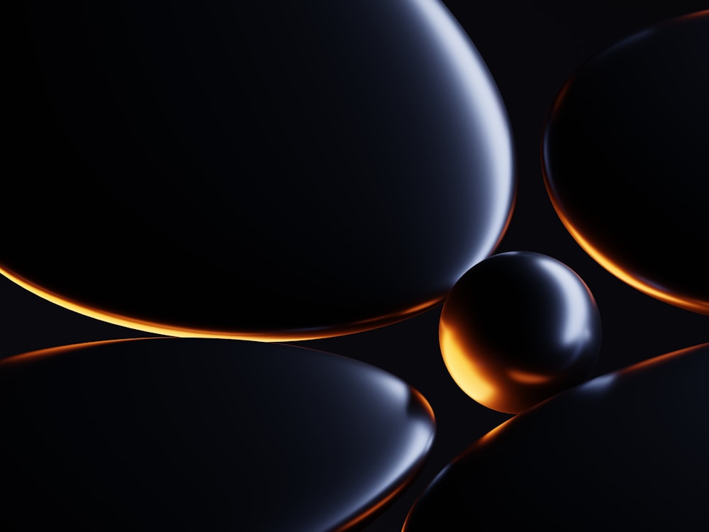 a black background with a bunch of shiny balls
