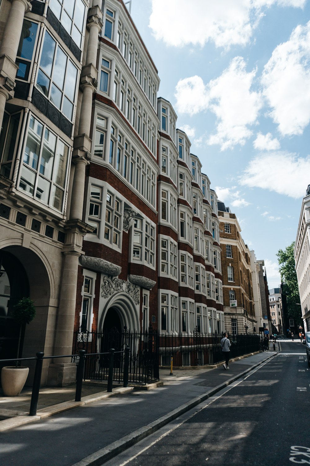 a row of buildings on a city street