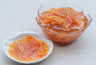 Close-up of fresh, ripe fruits arranged in a colorful bowl ready for marmalade making