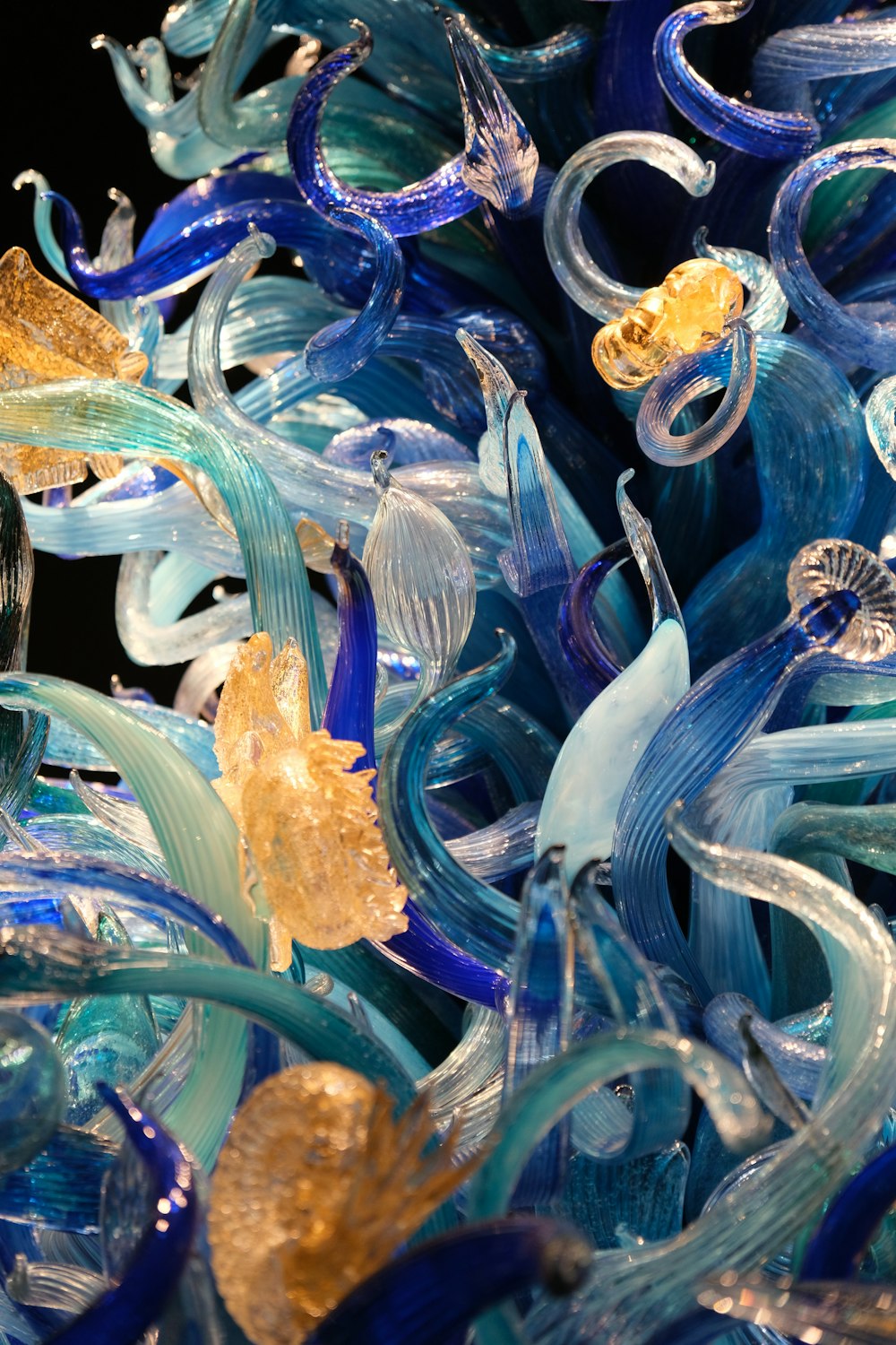 a close up of a bunch of glass pieces