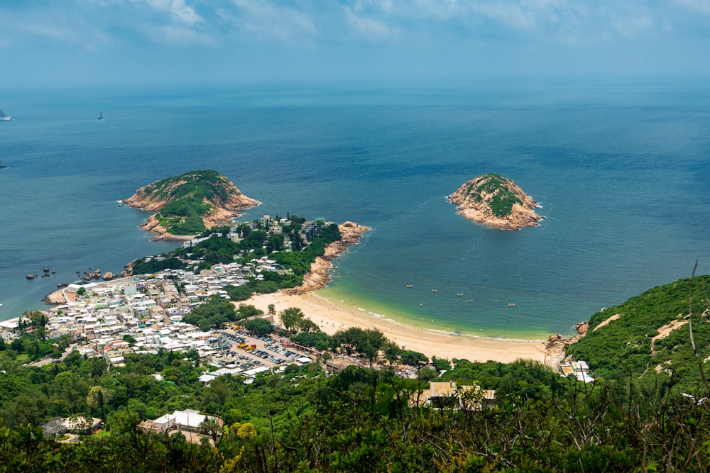 an aerial view of a small town on a beach