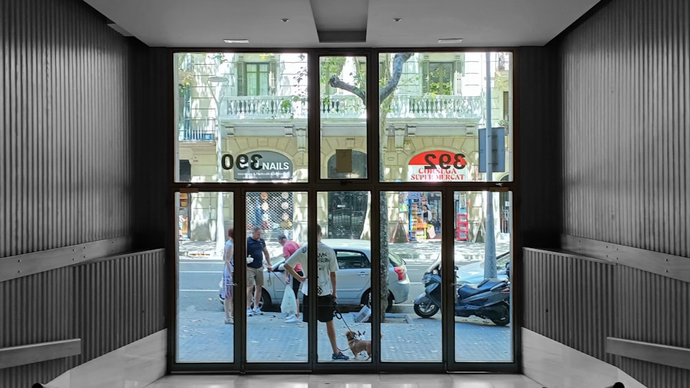 a person standing in front of a large window