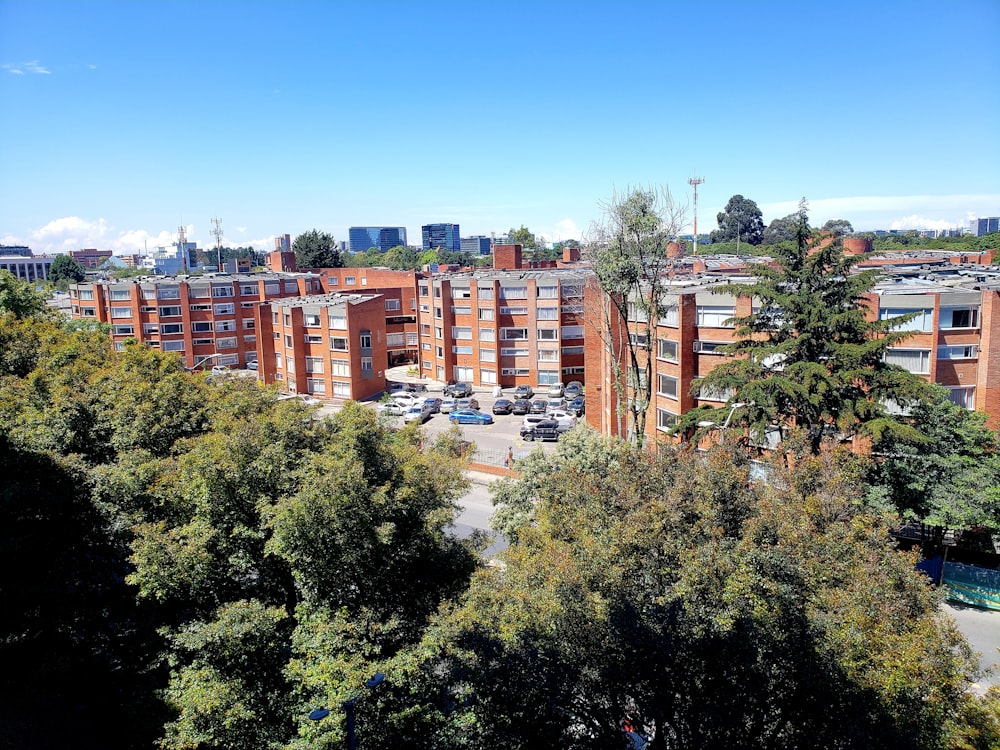 a view of a parking lot with cars parked in it