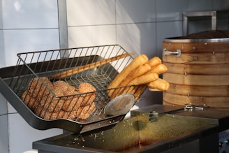 a bunch of food that is on a grill