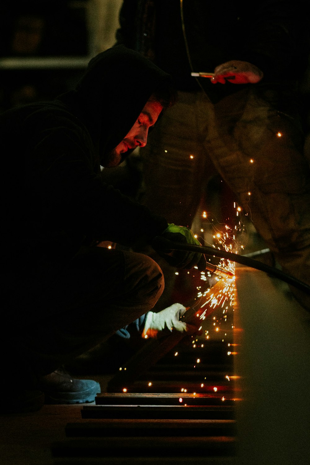 a man working on a piece of metal