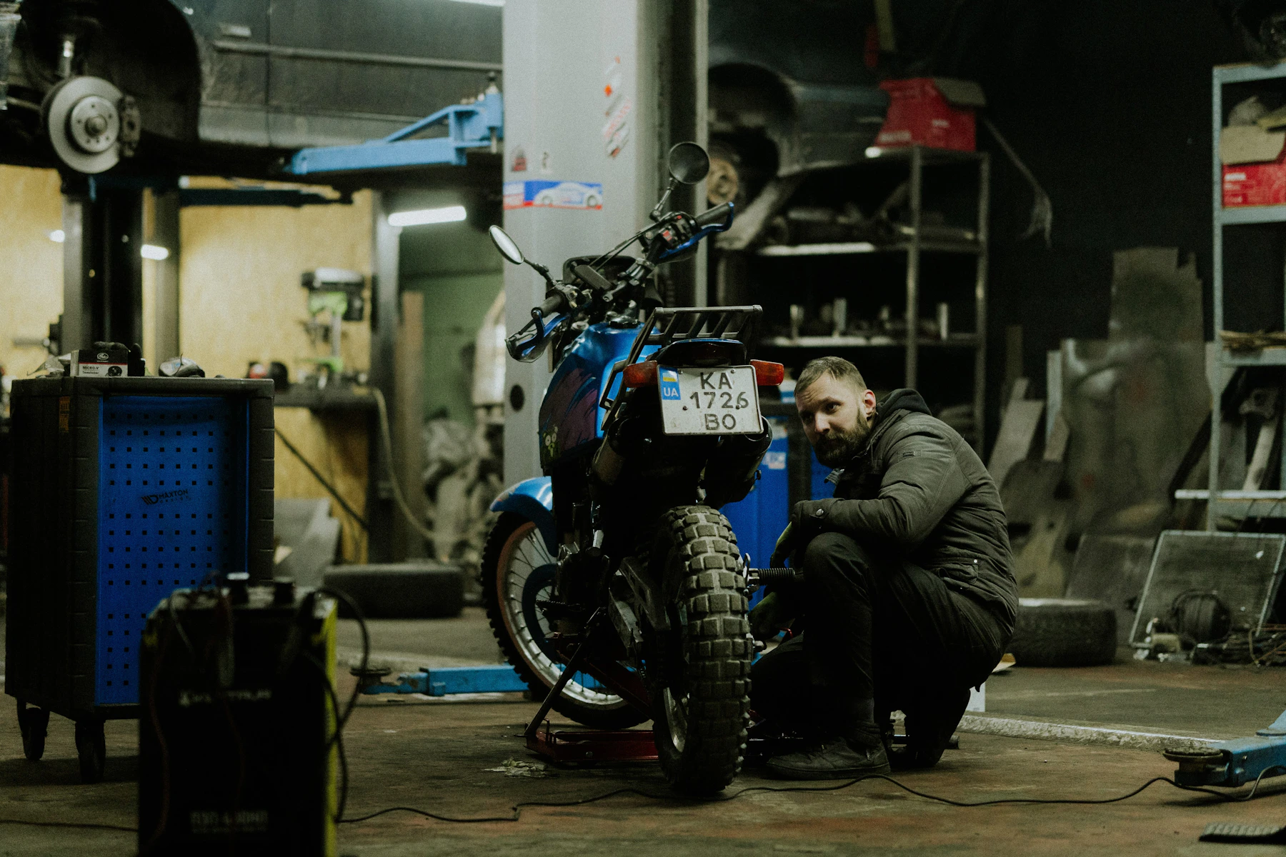 A custom motorcycle in a workshop
