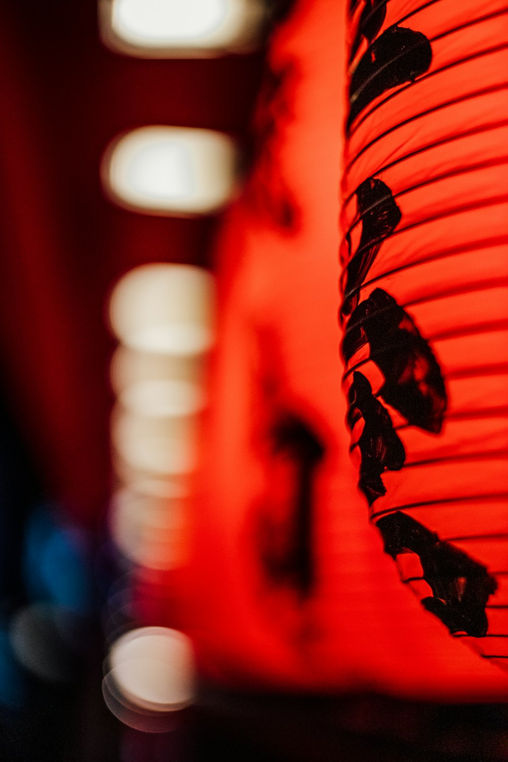 a close up of a red paper lantern