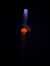 A sleek, modern network tower emitting vibrant light beams set against a dark slate gray background.