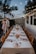 A romantic wedding setup with twinkling lights and exquisite table settings.
