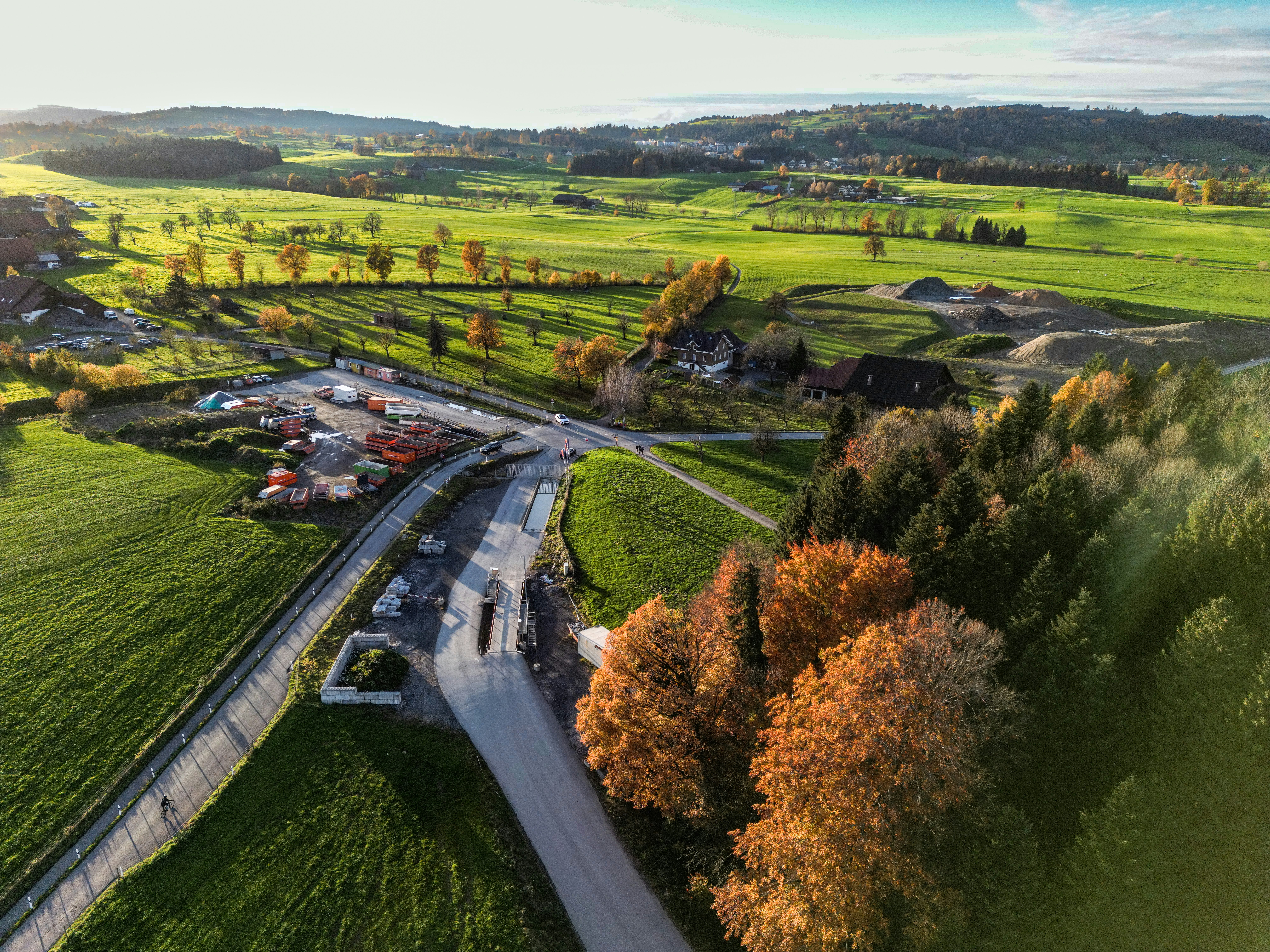 an aerial view of a rural area with a road running through it