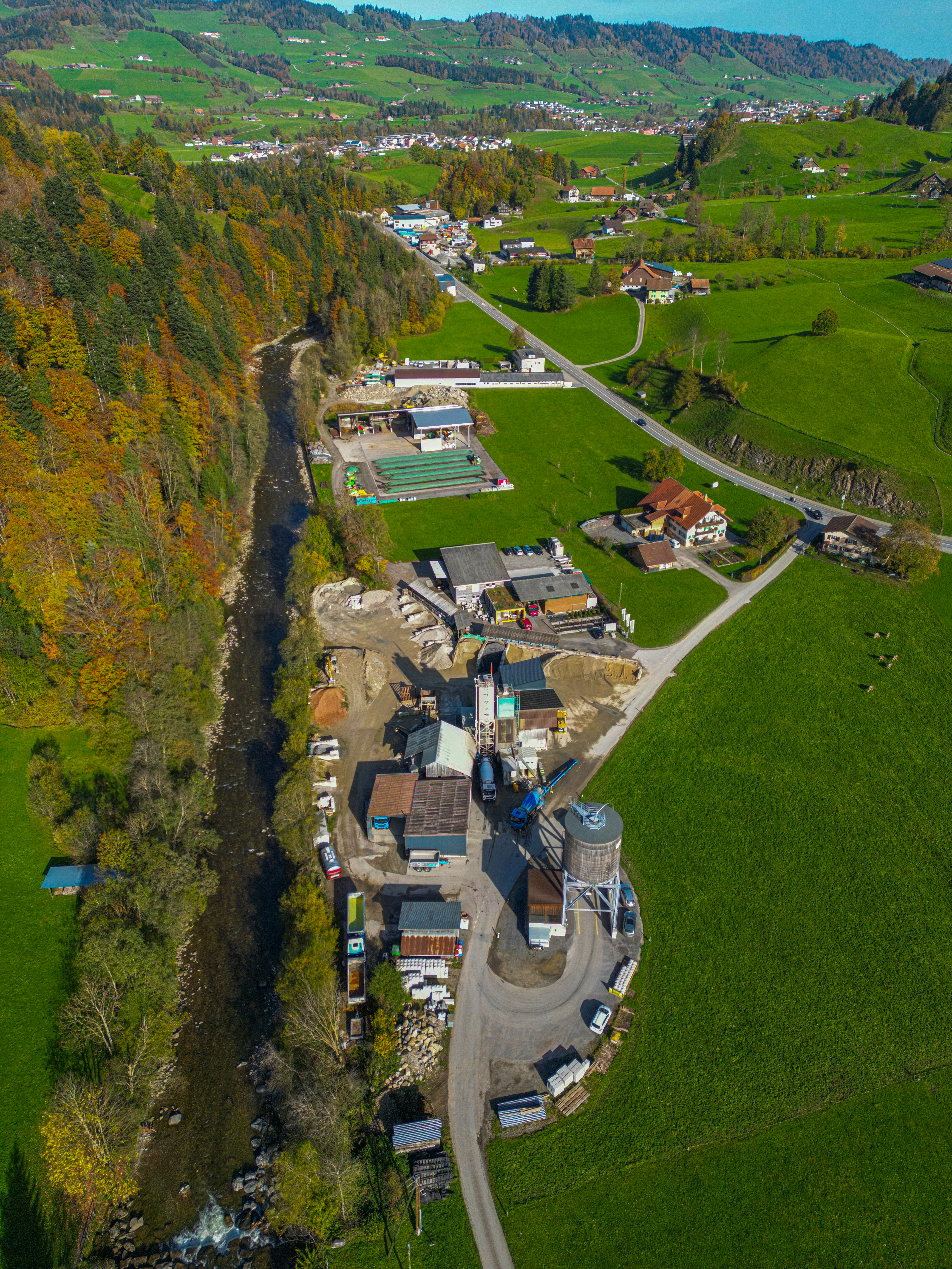 a bird's eye view of a large house in the middle of a green