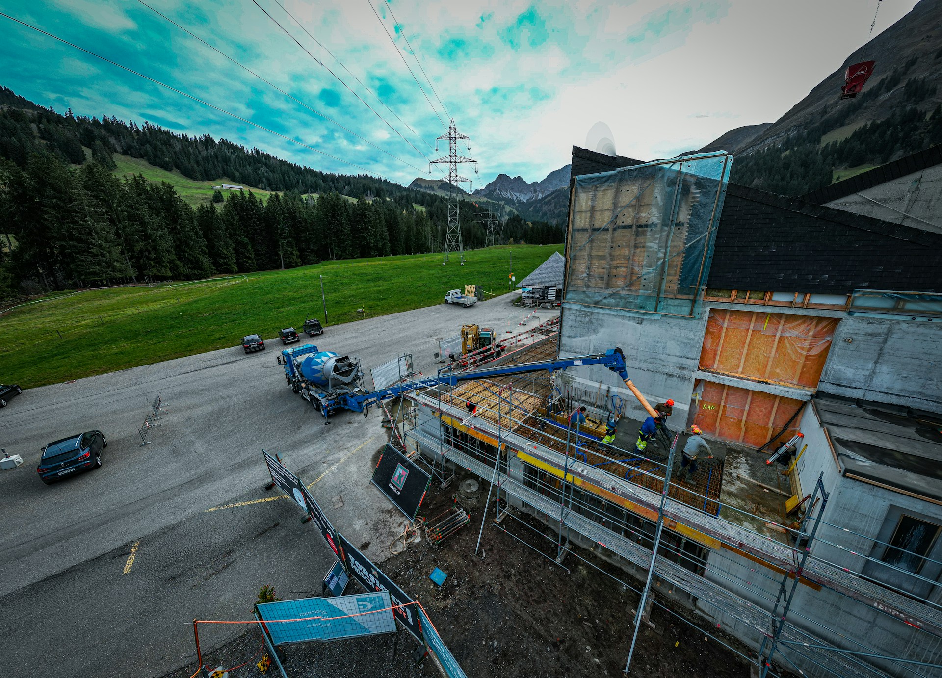 woman wearing yellow long-sleeved dress under white clouds and blue sky during daytime